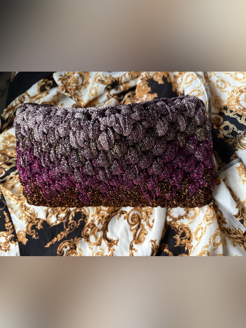 The Acacia Ombre Clutch from Lorenza Gandaglia is handmade in Italy